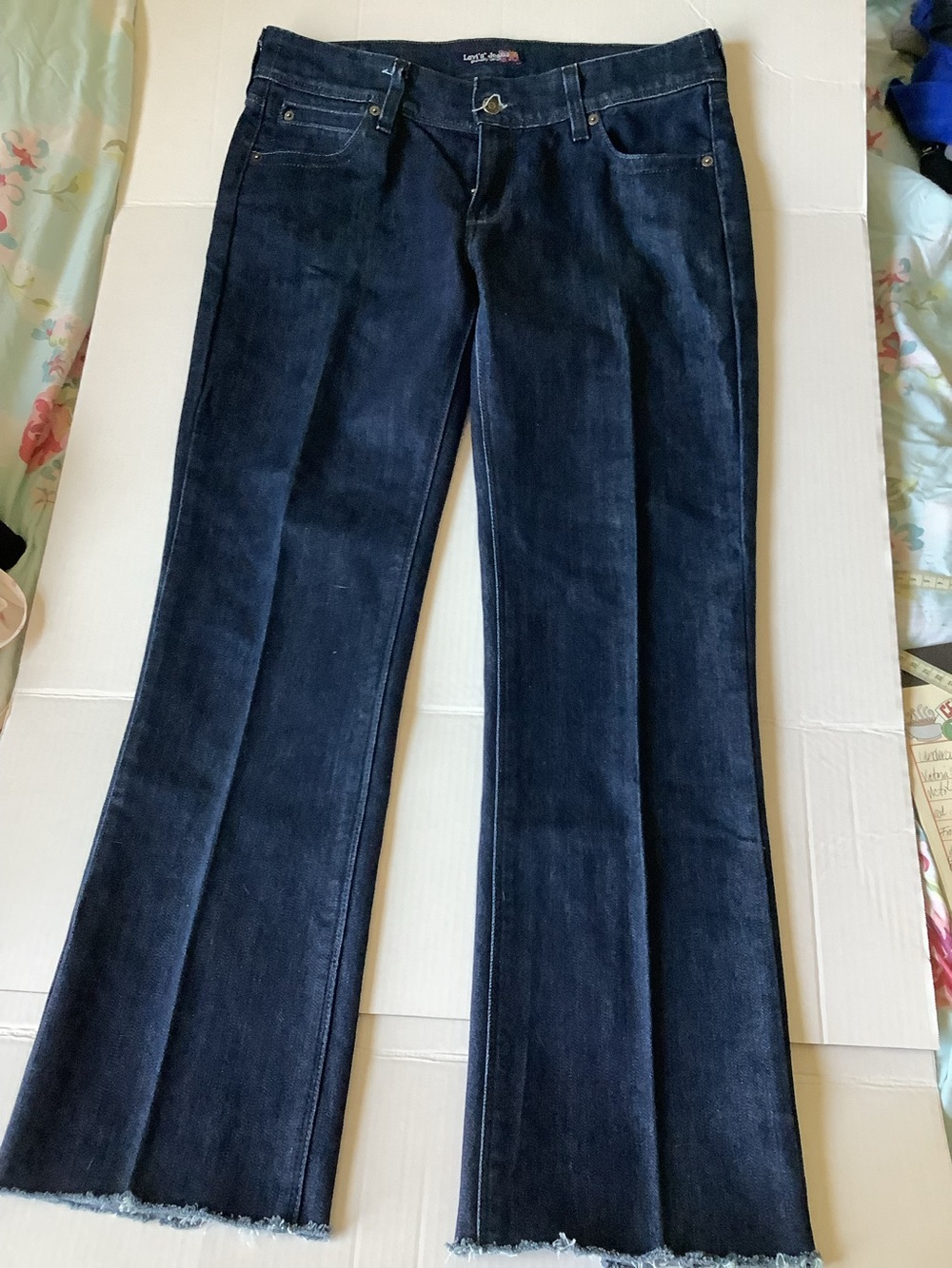Levi's Dark Blue Flare Jeans - Raw Hem